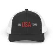 Black and white trucker cap with 'USA 250 YEARS' text on a white background.