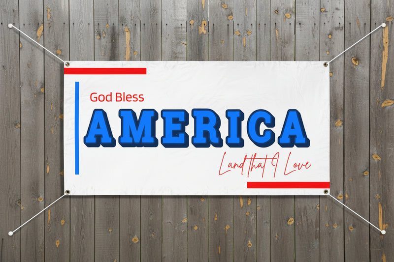 Patriotic “God Bless America” horizontal vinyl banner with blue stripes and red and blue stars, 72x36 and 48x24 inches on a wood fence.