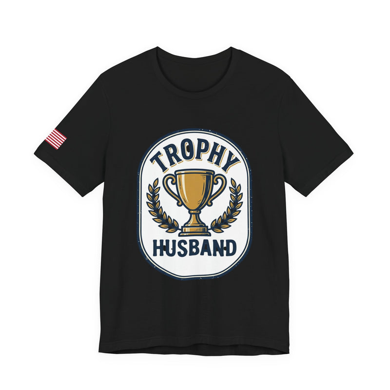 Black t-shirt with 'Trophy Husband' graphic on a white background
