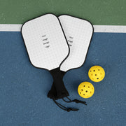 Customizable white pickleball paddle set with black handle displayed on a pickle ball court. 