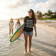 Woman wearing custom text t-shirt on the beach — personalized Bella Canvas 3001 unisex tee.